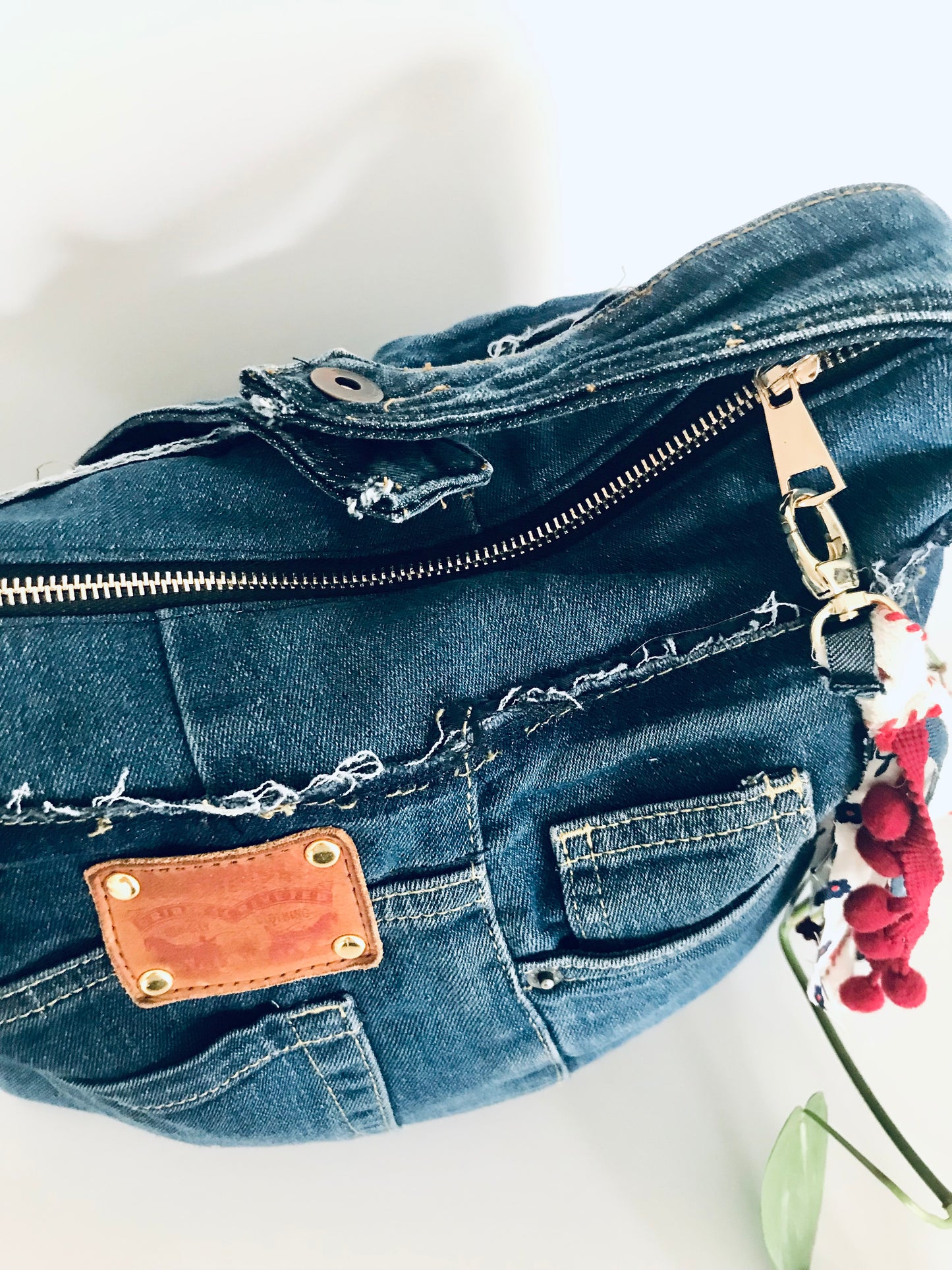 Conscious Carry-all with blue denim and upcycled tassle