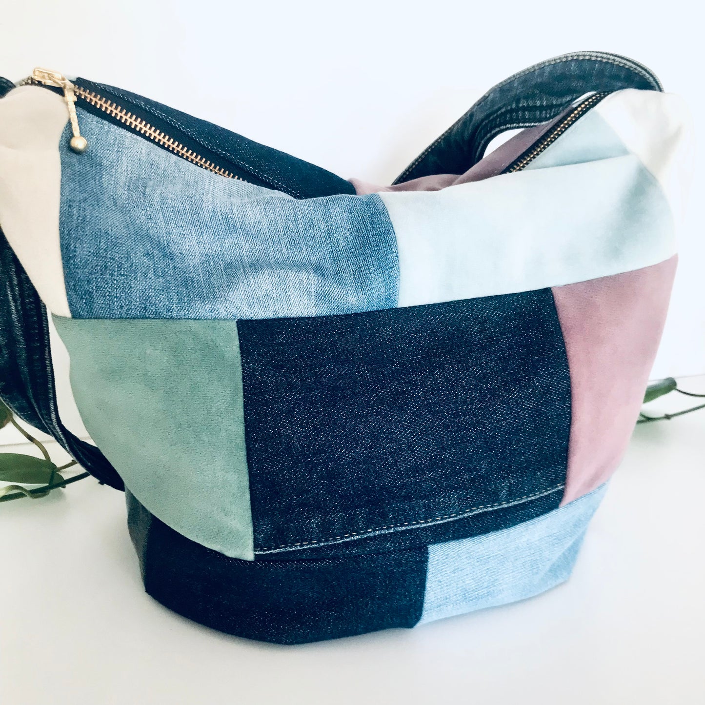 Plush denim and fabric swatch hobo bag