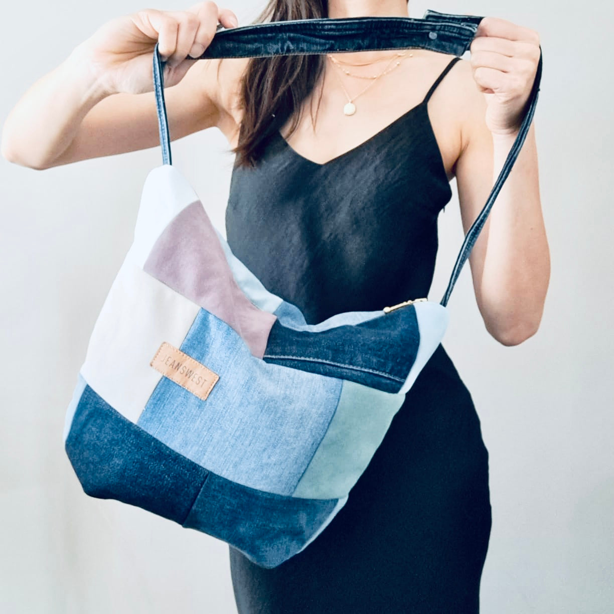 Plush denim and fabric swatch hobo bag