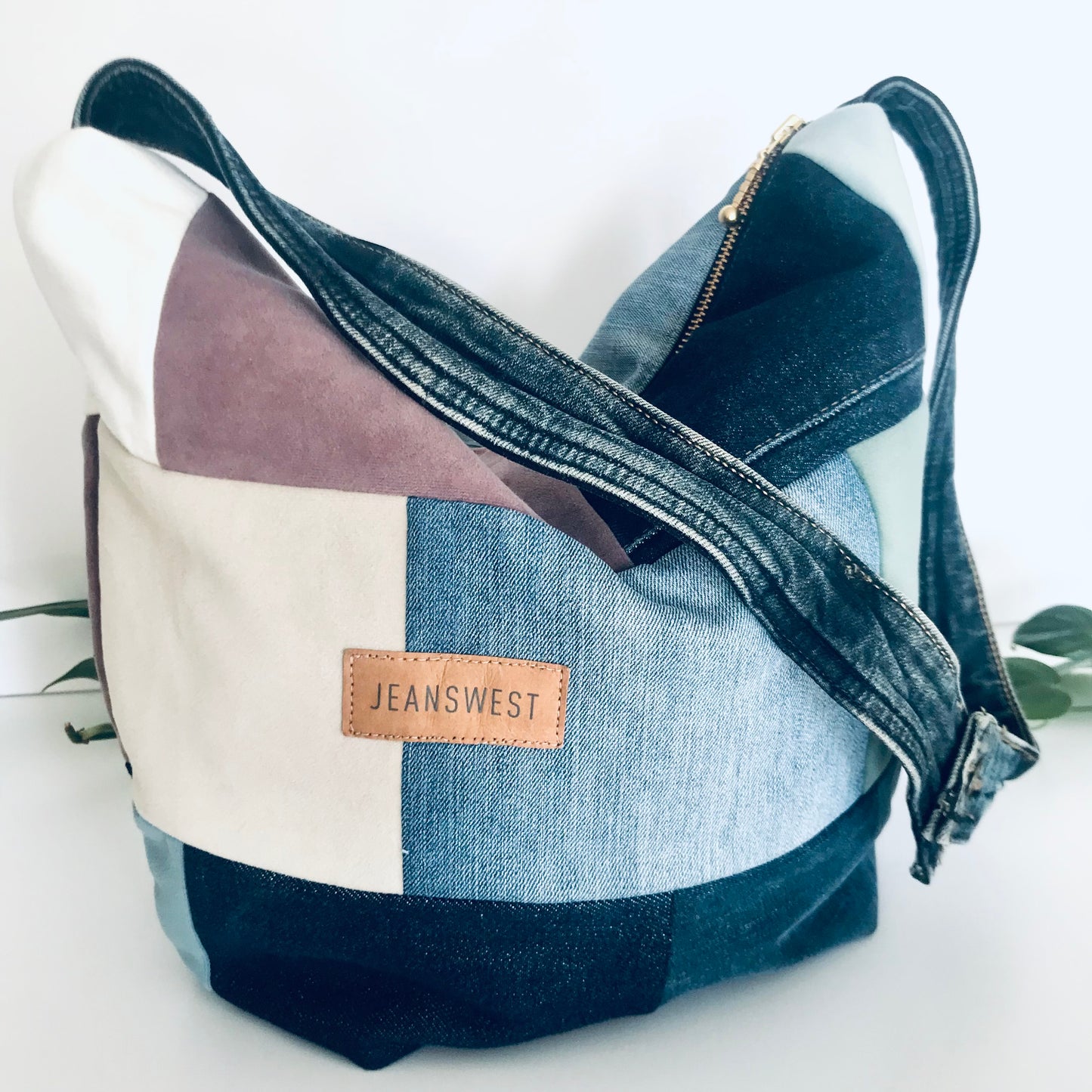 Plush denim and fabric swatch hobo bag