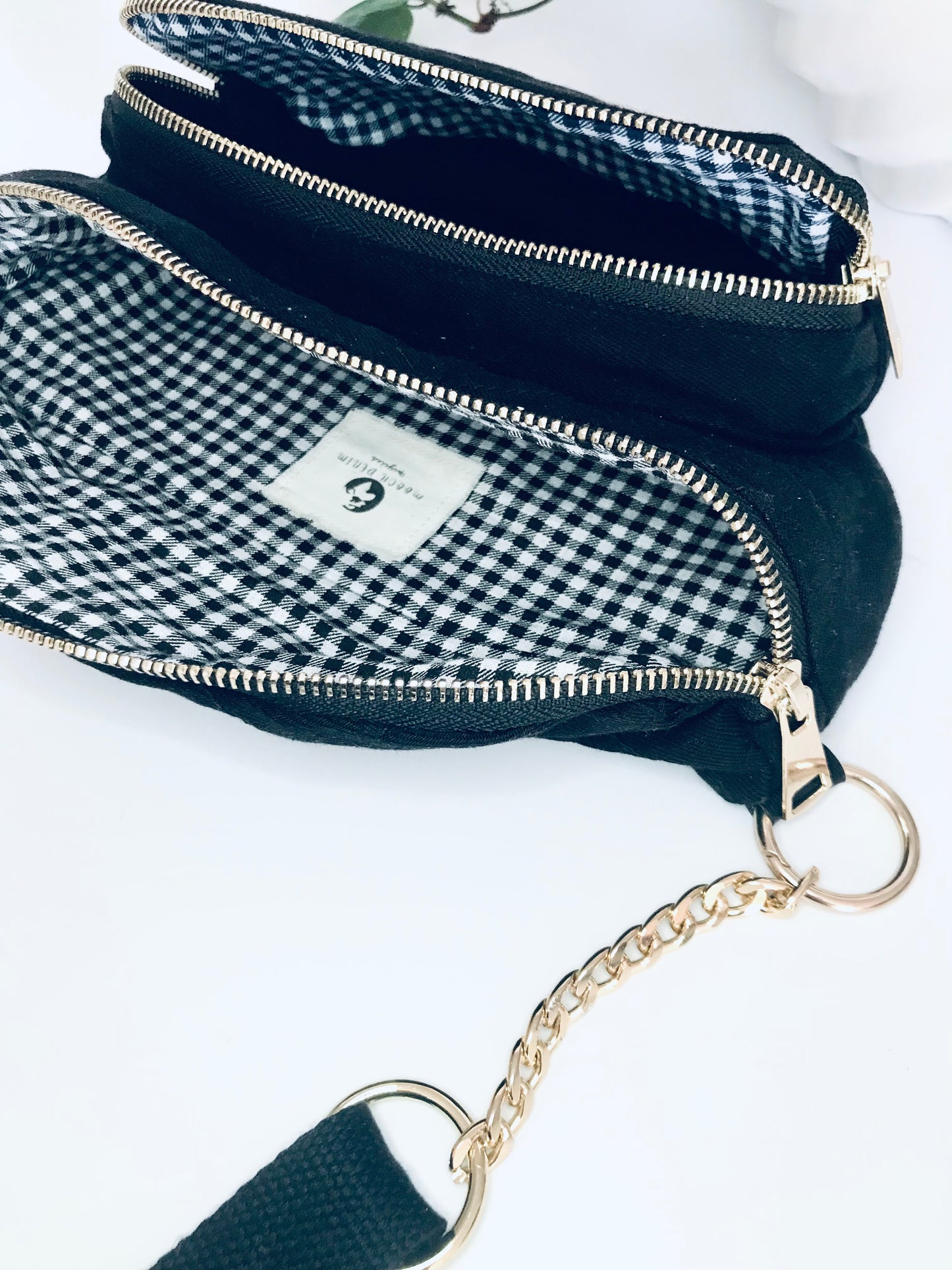 Black denim waist pack with gold chain detail