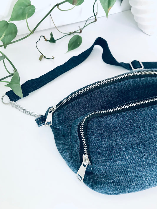 Blue denim waist pack with  silver chain detail