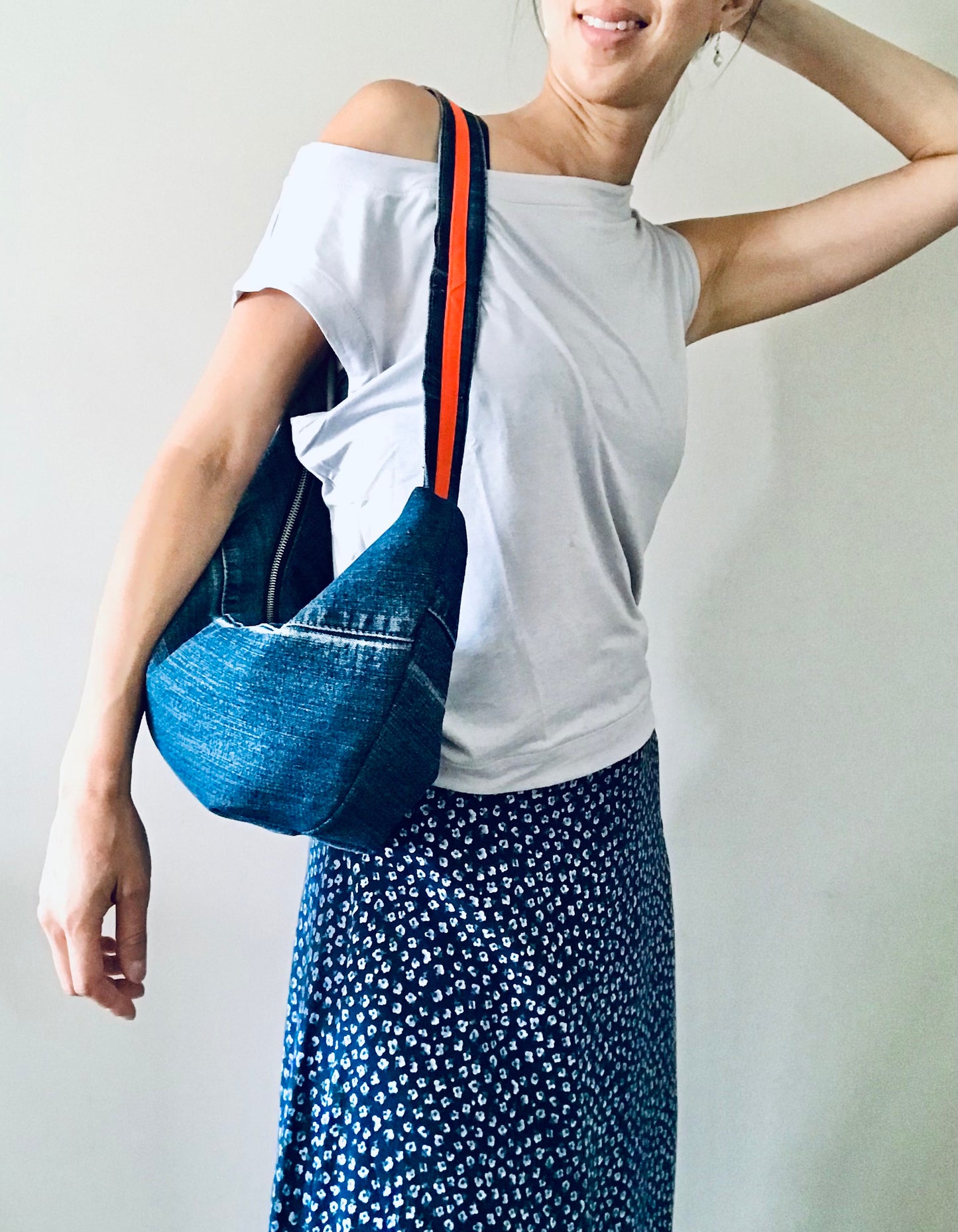 Hobo Zero with classic blue denim, orange trim and matching zipper pouch