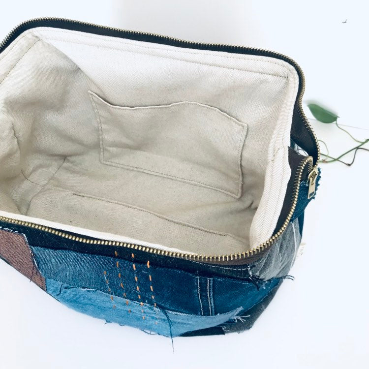 Upcycled large travel pouch with denim patchwork