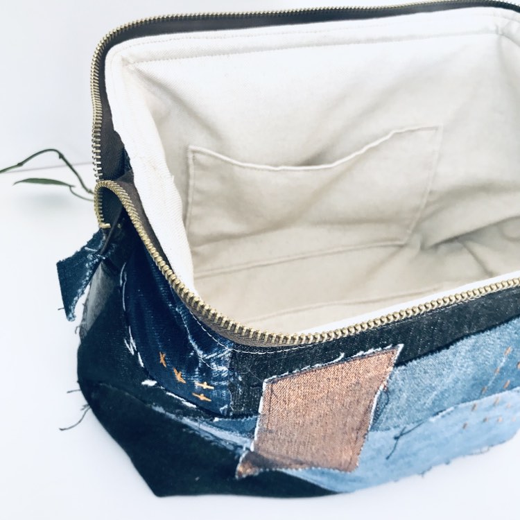 Upcycled large travel pouch with denim patchwork