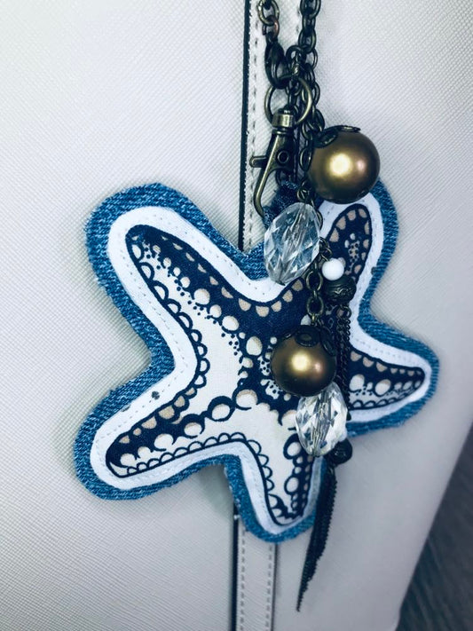 Ocean inspired upcycled denim and vintage necklace bag charm with seastar pendant