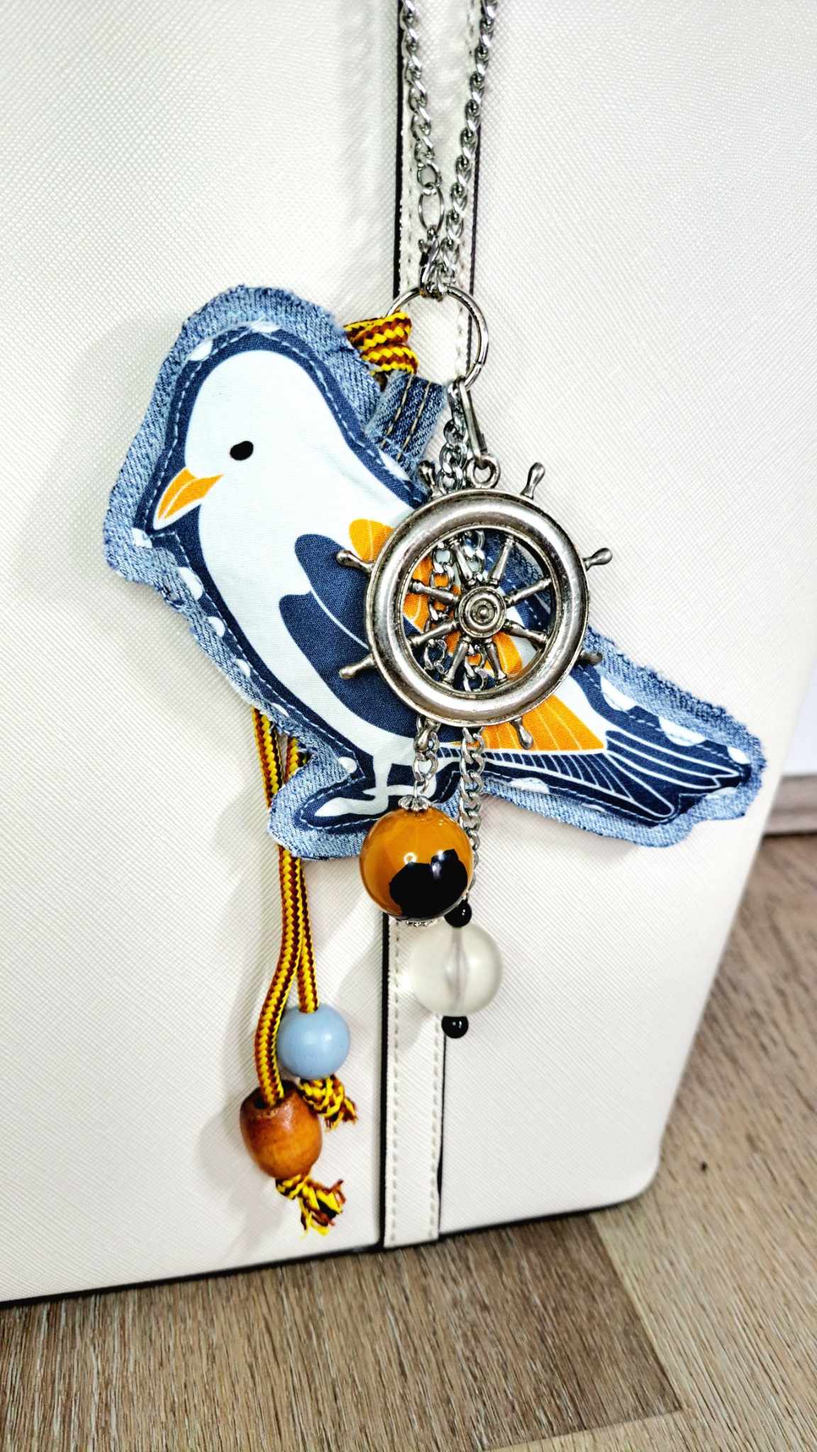 Maritime inspired upcycled denim and vintage necklace bag charm with nautical pendant