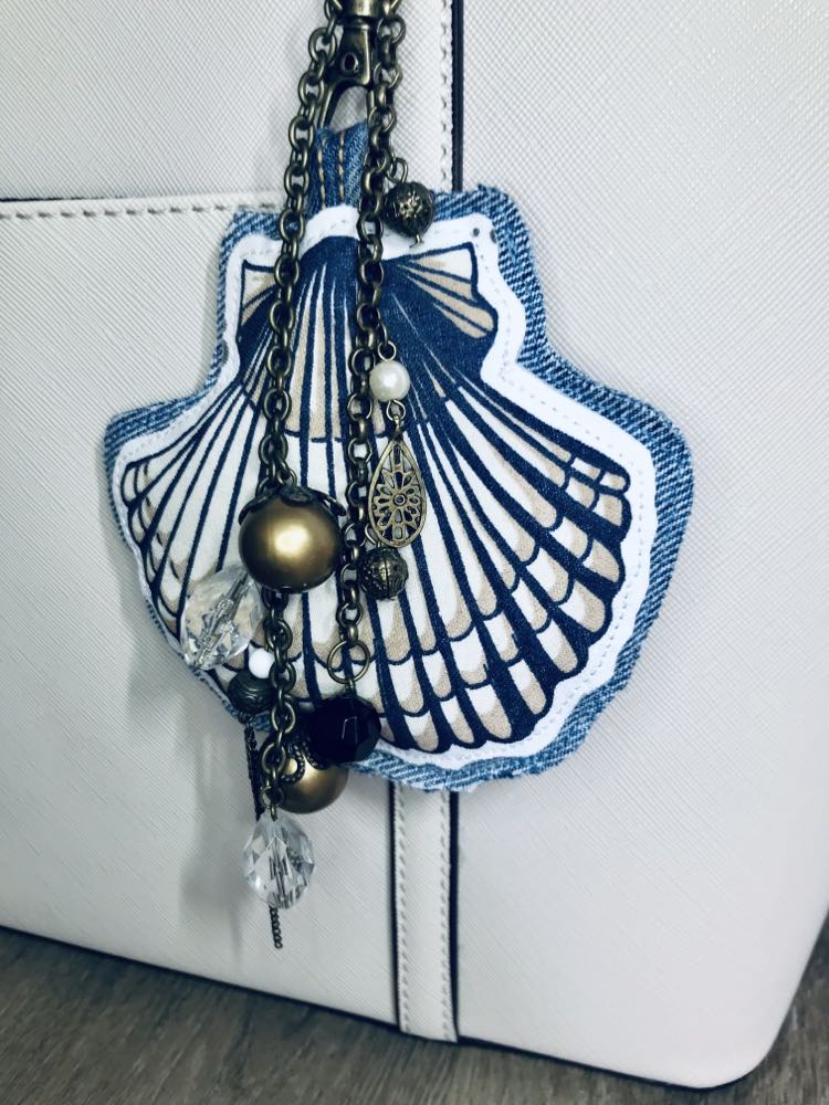 Ocean inspired upcycled denim and vintage necklace bag charm with scallop pendant