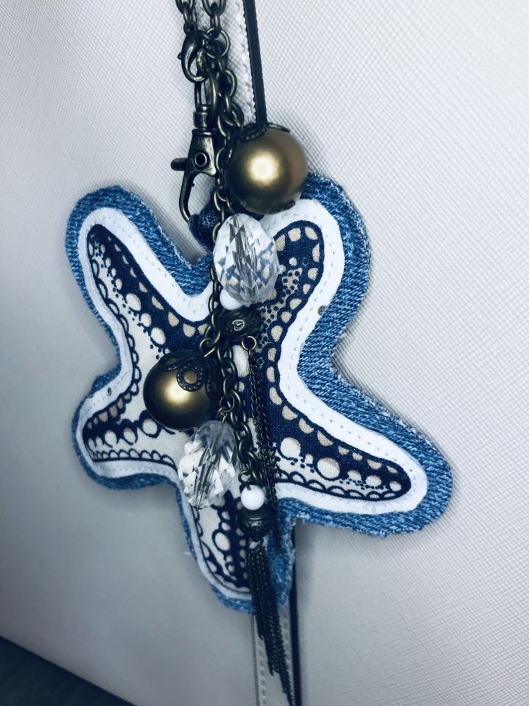 Ocean inspired upcycled denim and vintage necklace bag charm with seastar pendant