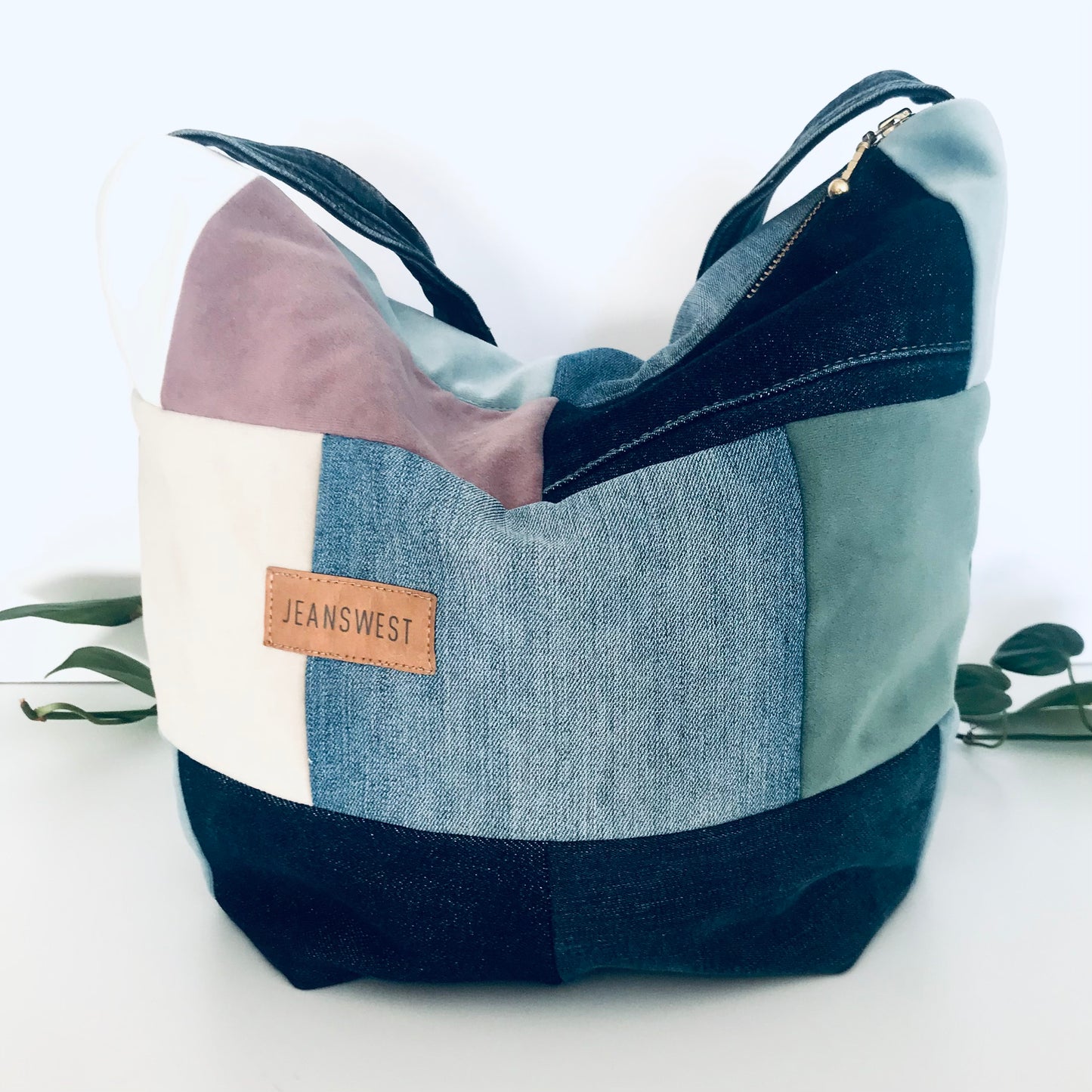 Plush denim and fabric swatch hobo bag