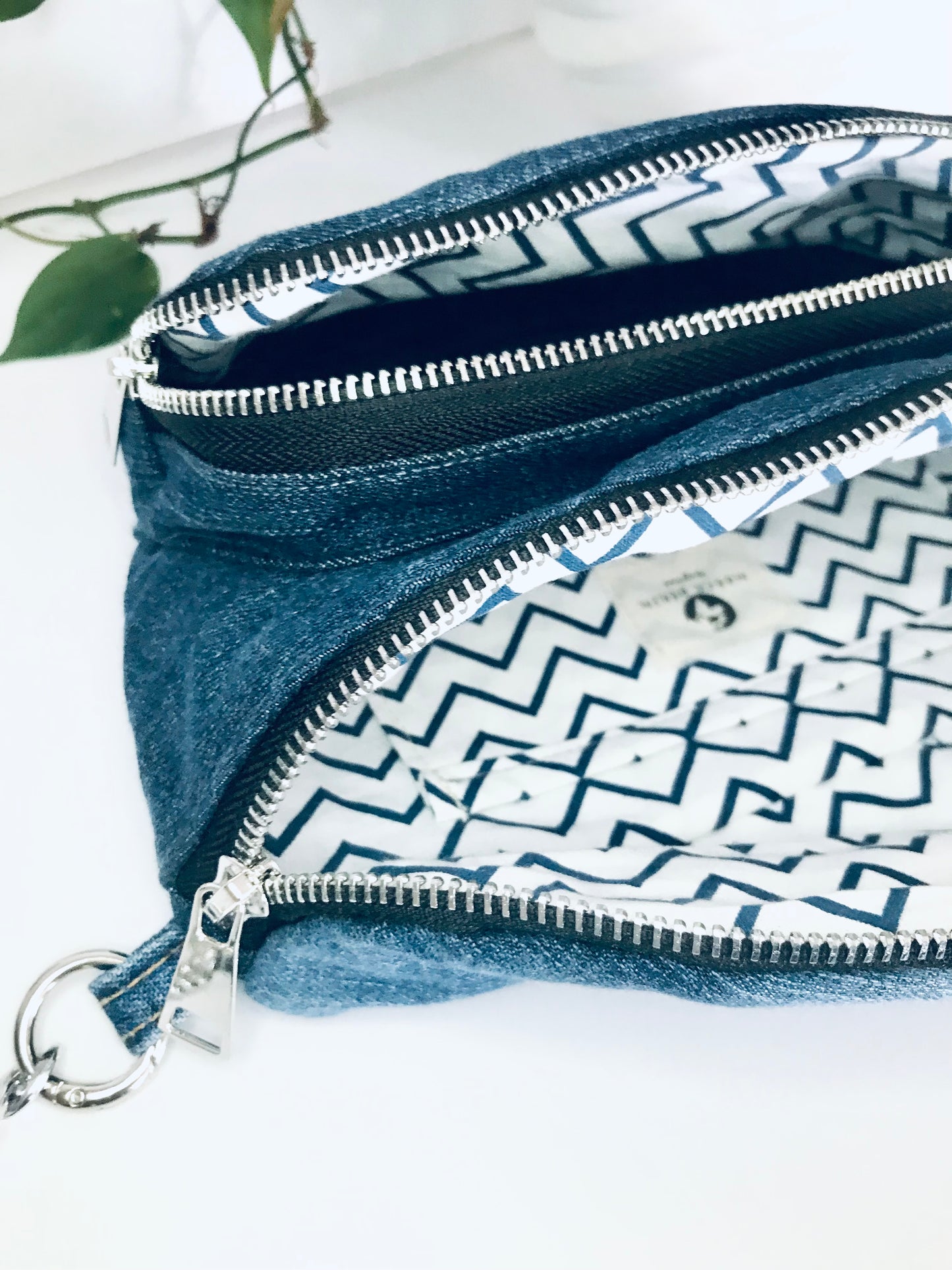 Blue denim waist pack with  silver chain detail