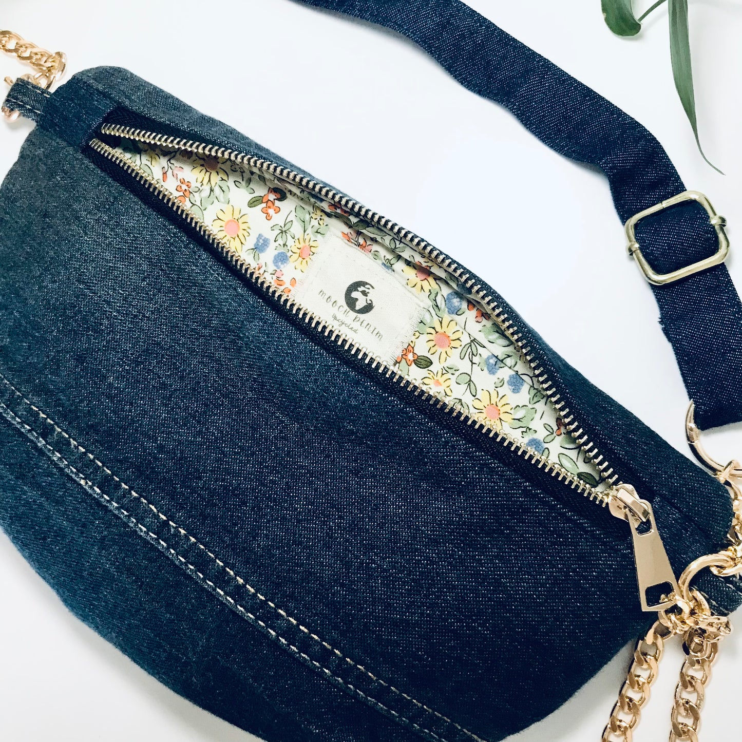 Indigo denim sling bag with gold chain detail