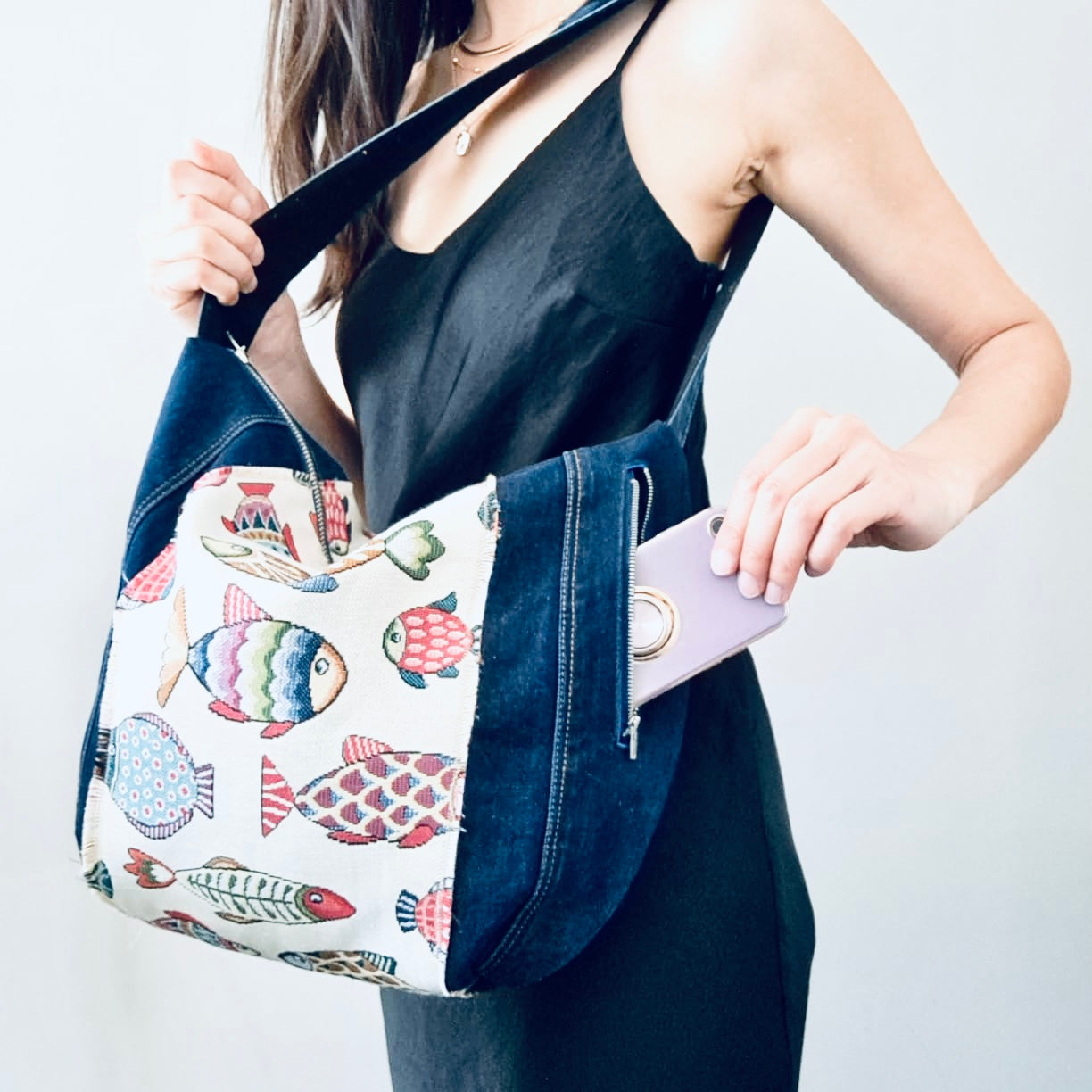 Upcycled denim hobo bag with festive fishes