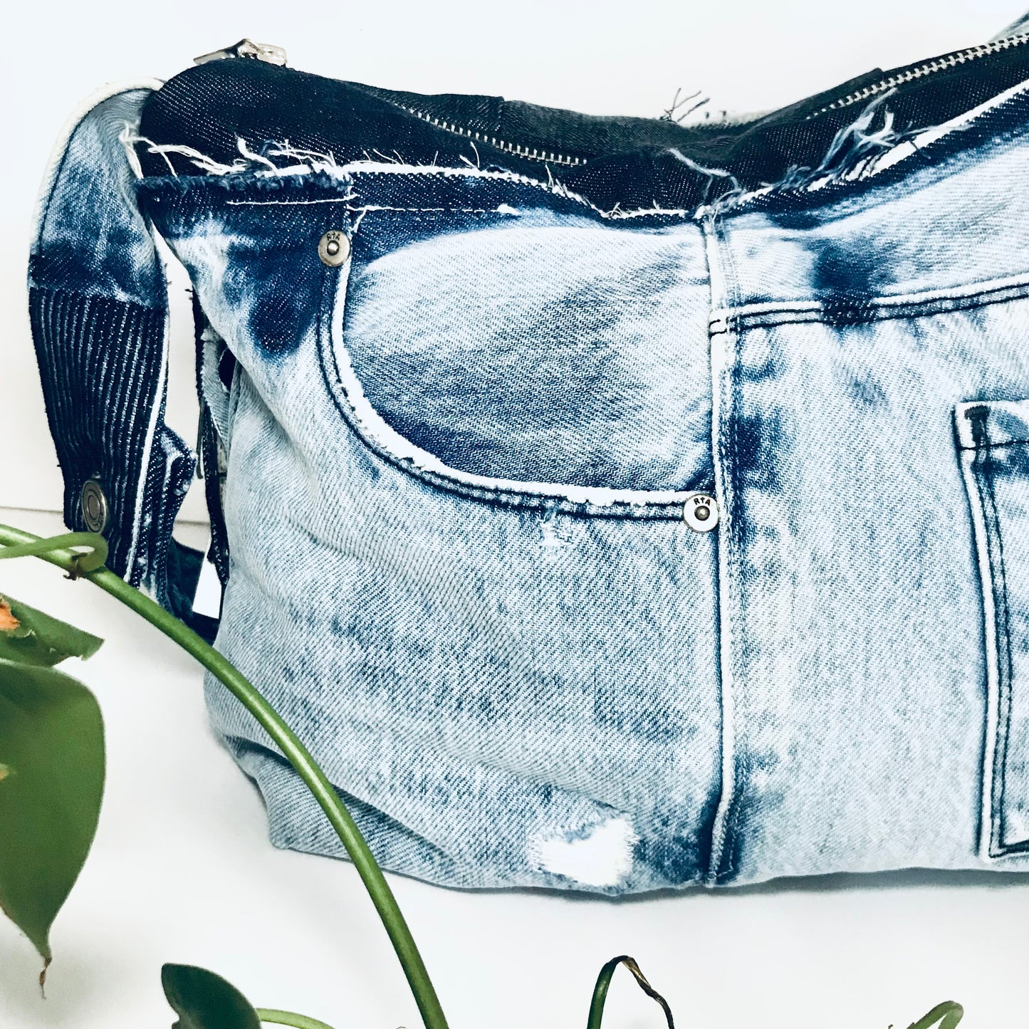 Conscious Carry-all with light blue denim and Paris lining with upcycled tassle