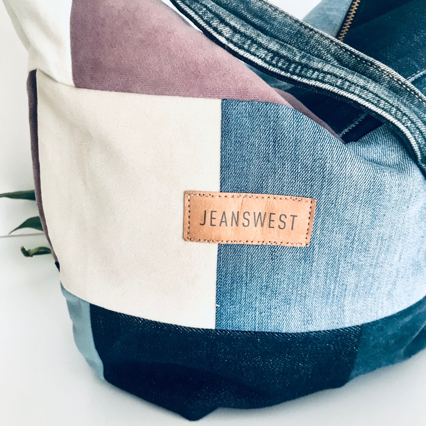 Plush denim and fabric swatch hobo bag