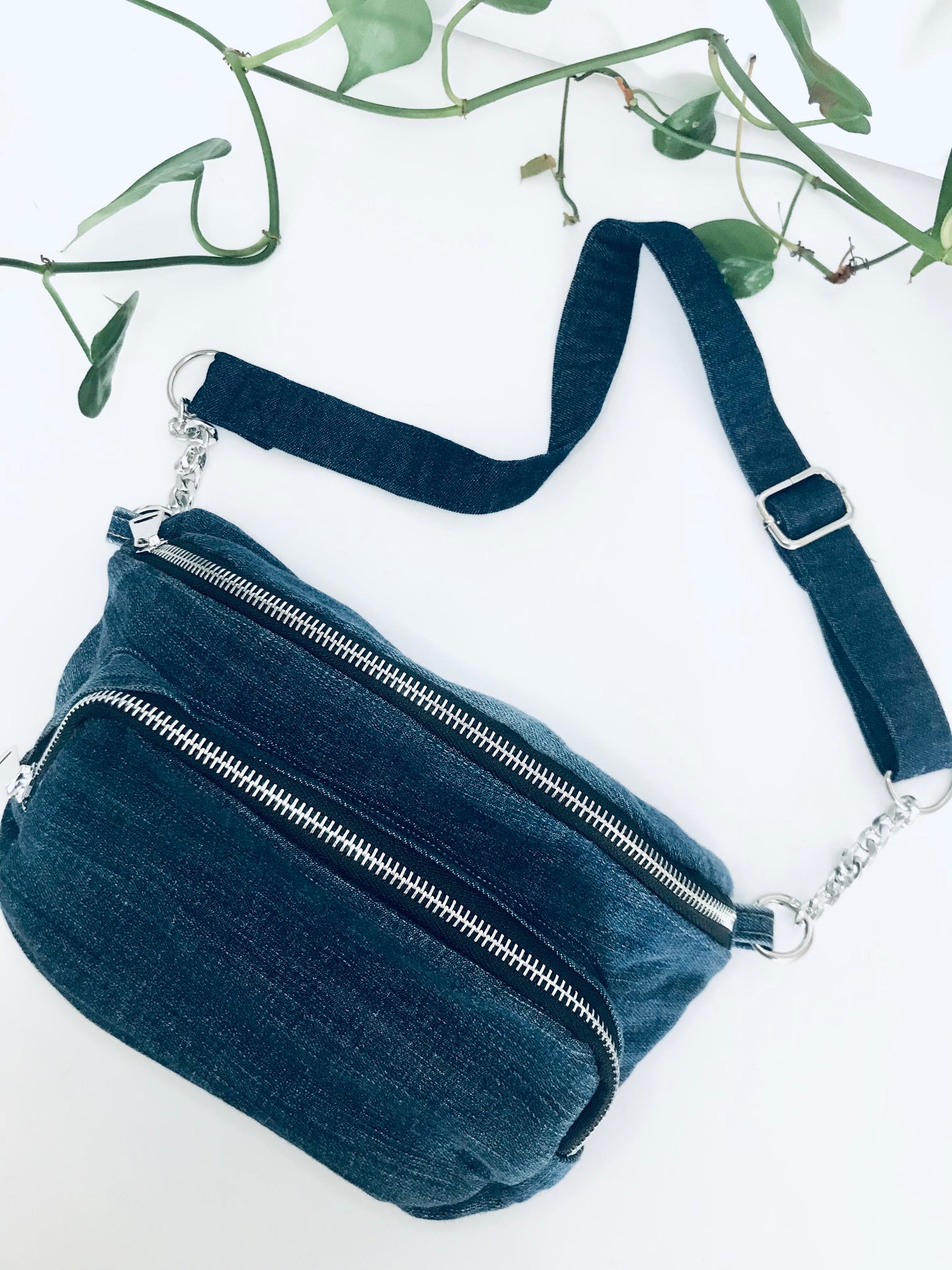 Blue denim waist pack with  silver chain detail