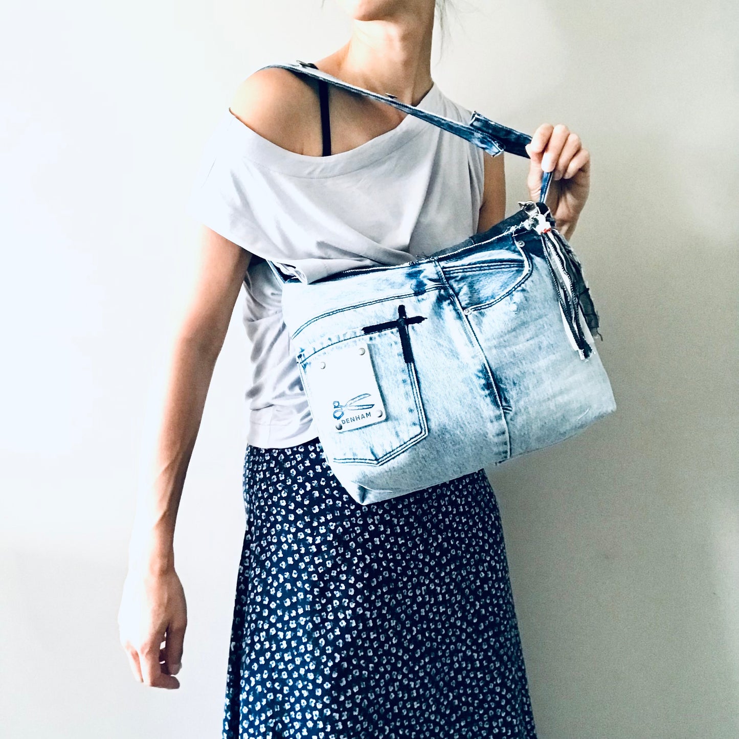 Conscious Carry-all with light blue denim and Paris lining with upcycled tassle