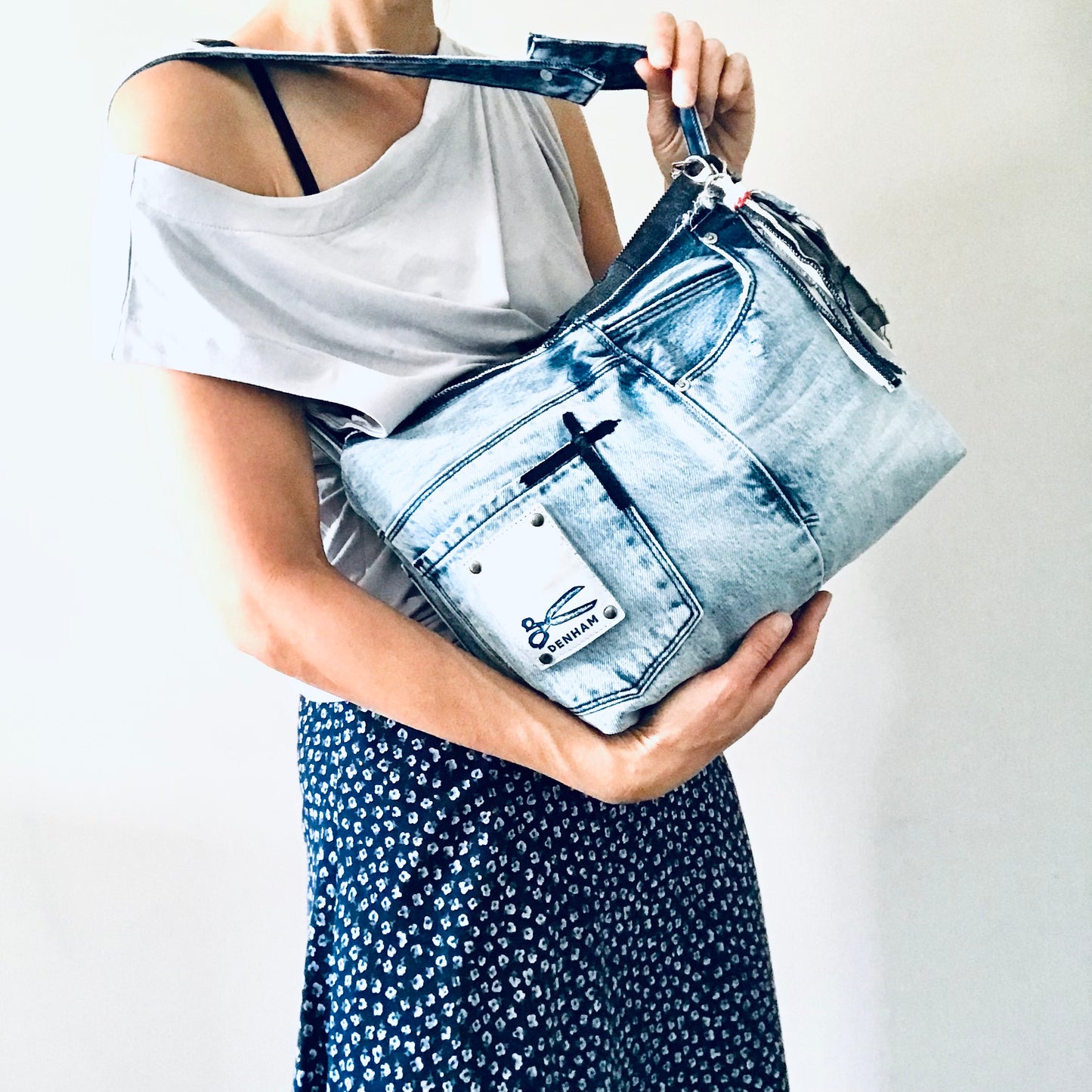 Conscious Carry-all with light blue denim and Paris lining with upcycled tassle