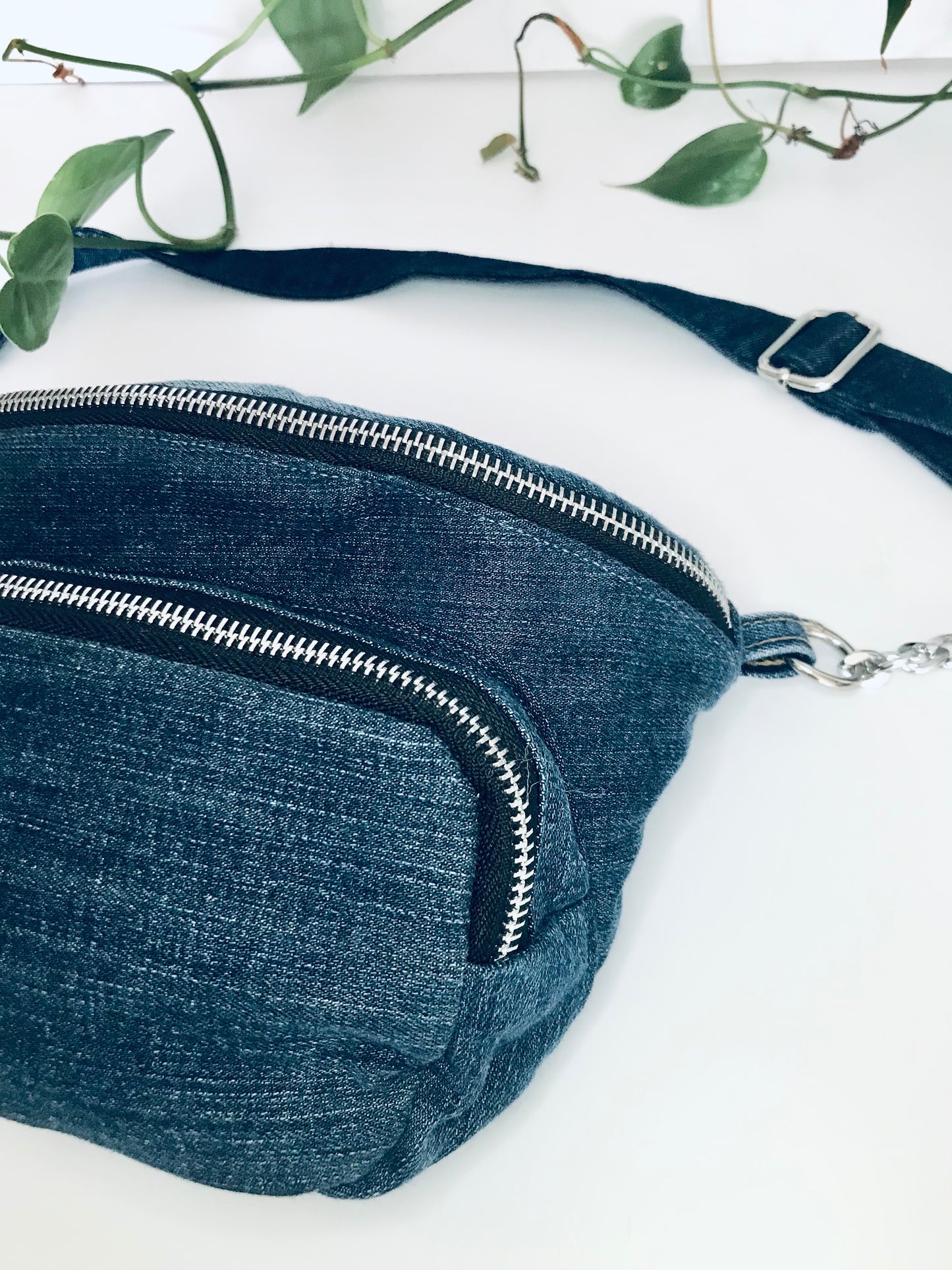 Blue denim waist pack with  silver chain detail