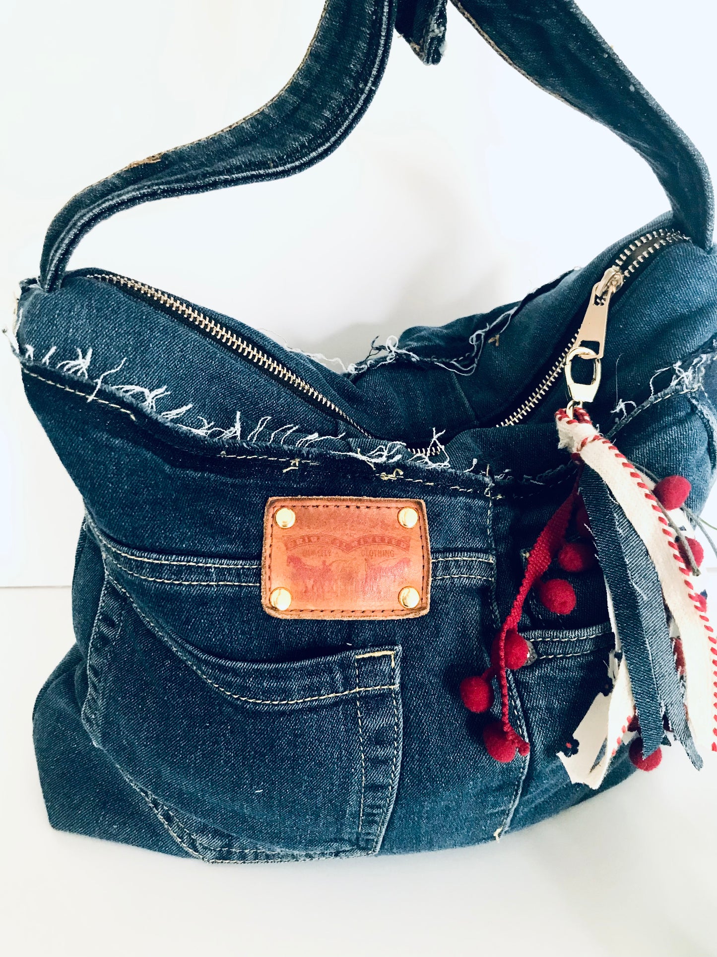 Conscious Carry-all with blue denim and upcycled tassle