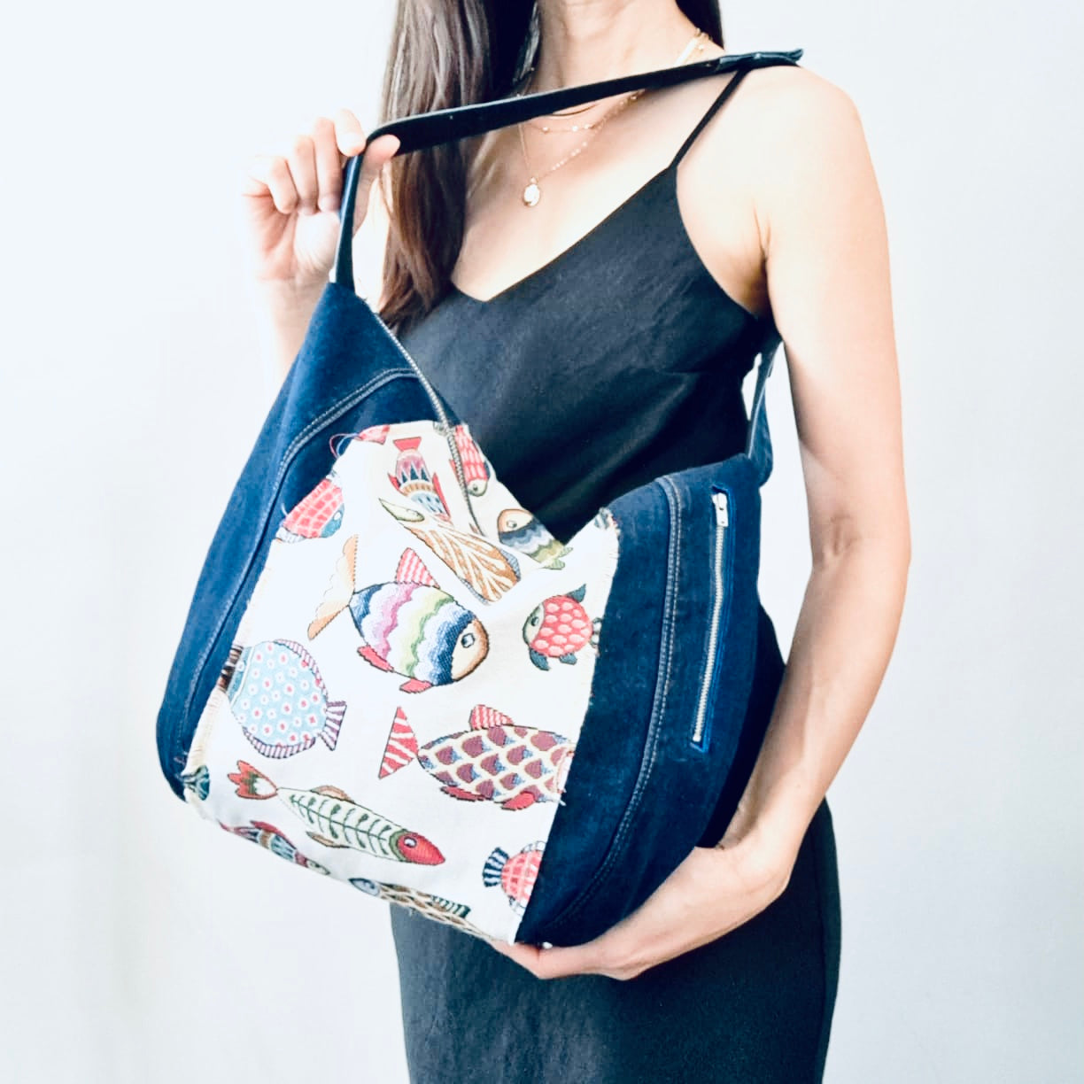 Upcycled denim hobo bag with festive fishes