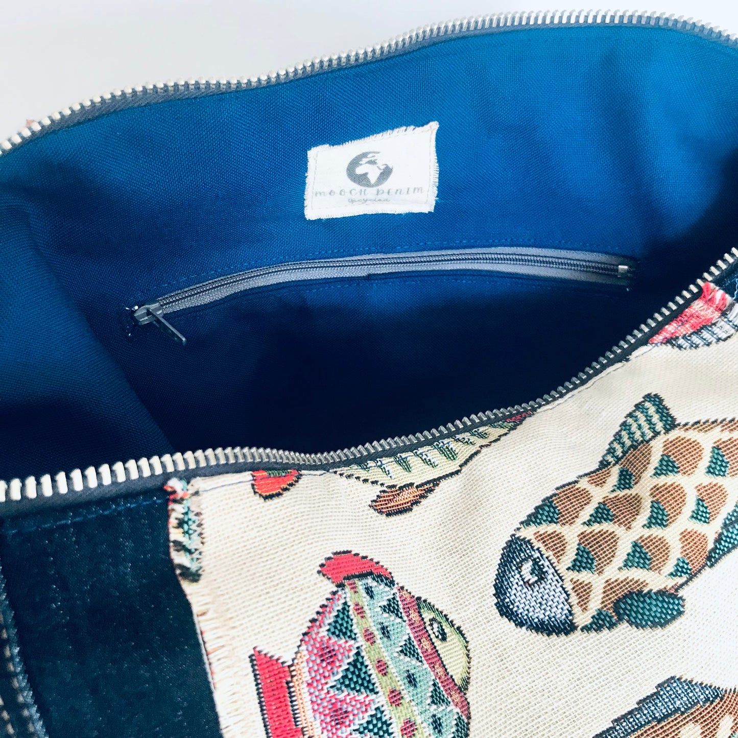 Upcycled denim hobo bag with festive fishes