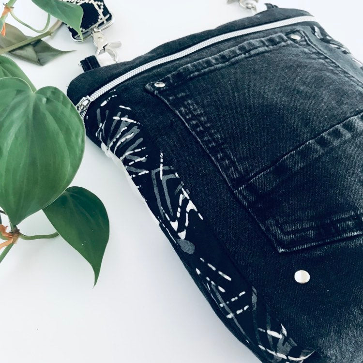 Upcycled crossbody everyday bag with black denim and black and white graphic lining