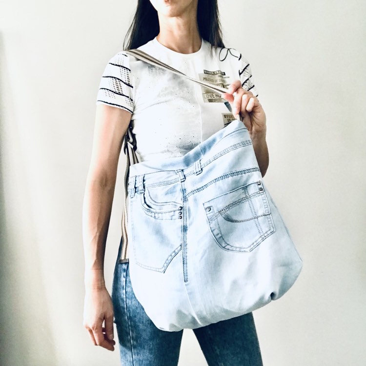 Upcycled denim hobo bag with tropical forest lining