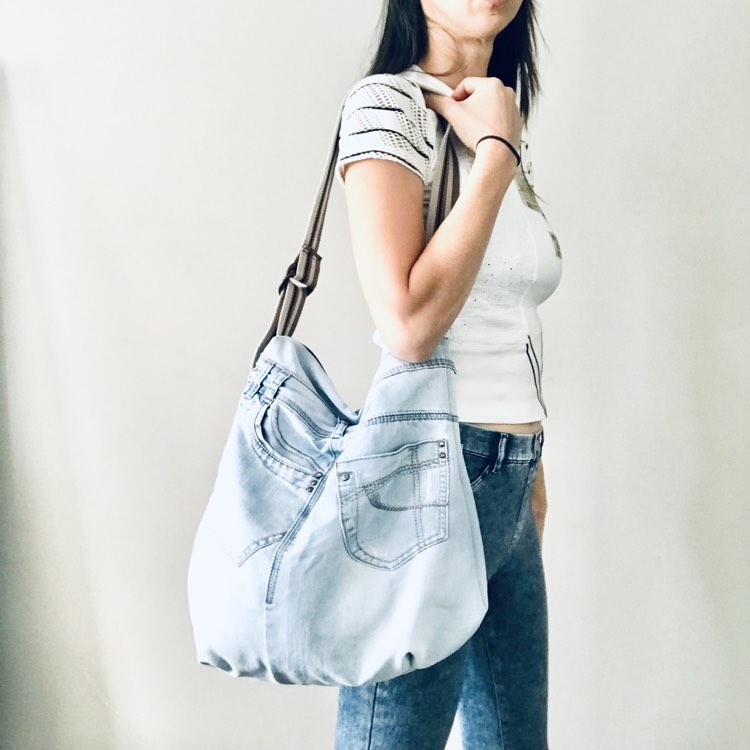 Upcycled denim hobo bag with tropical forest lining