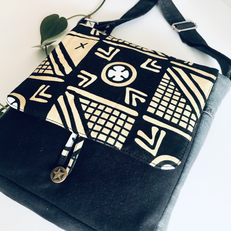 Upcycled bold denim messenger bag in graphic black