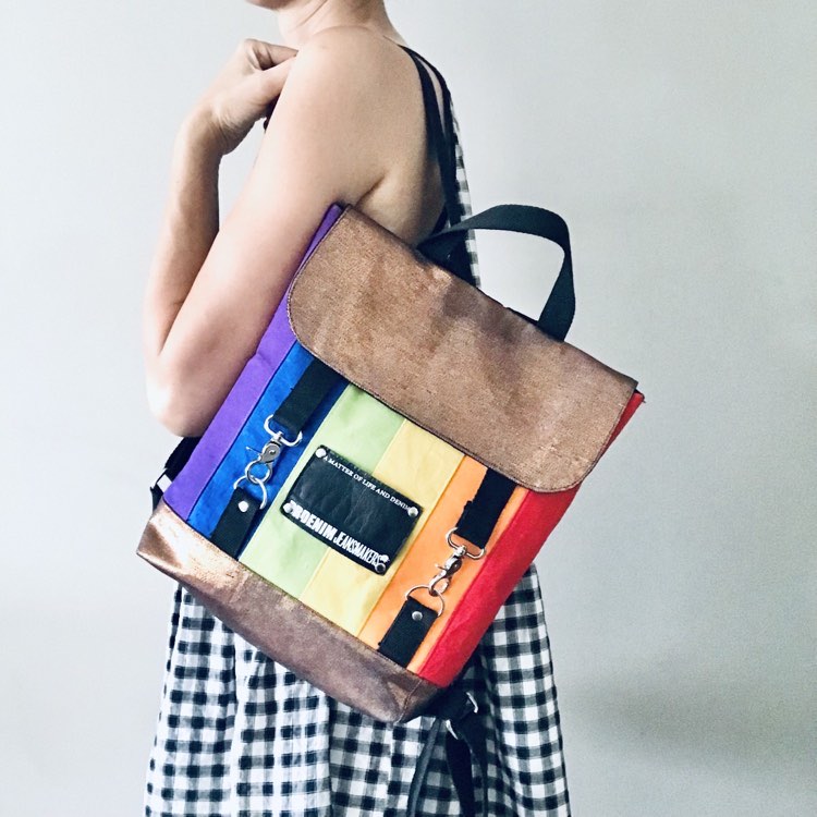 Rainbow backpack with black and bronze denim