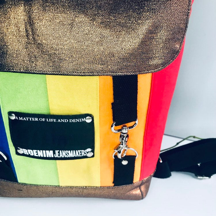 Rainbow backpack with black and bronze denim