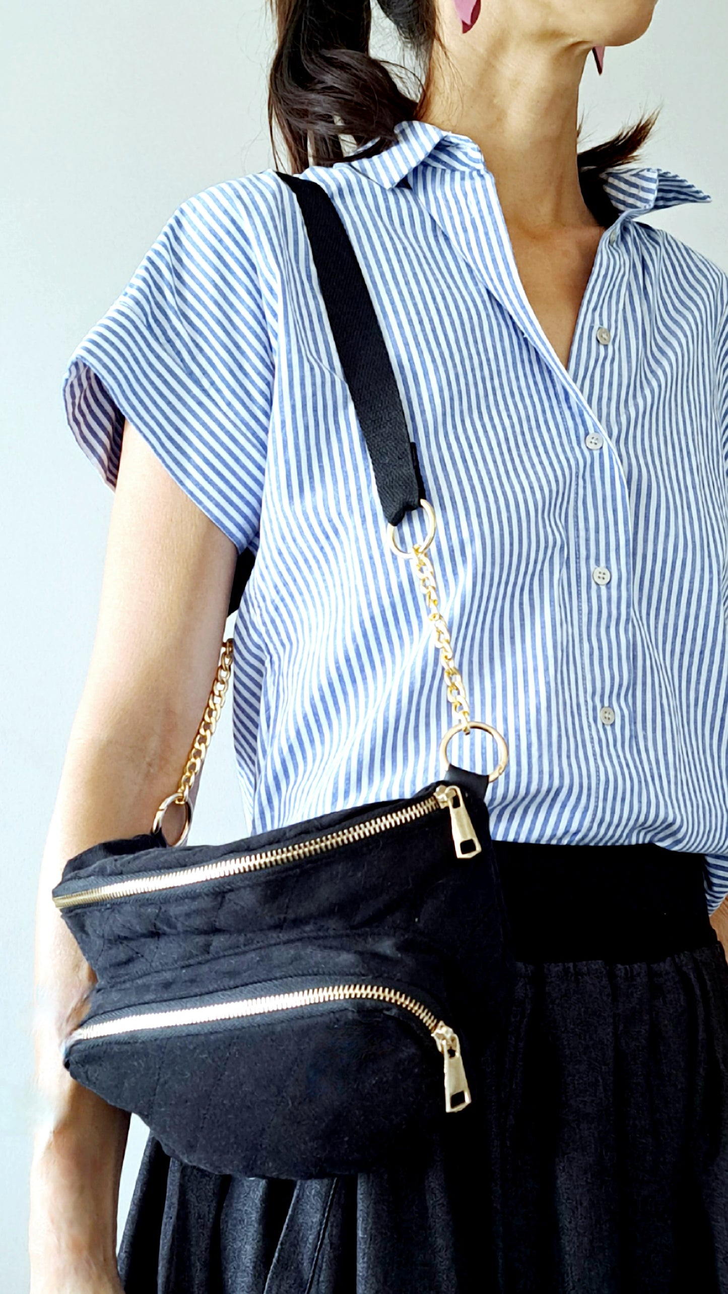 Black denim waist pack with gold chain detail